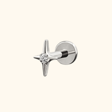 Load image into Gallery viewer, silver earring with star design and clear cubic zirconia stone on a light yellow background