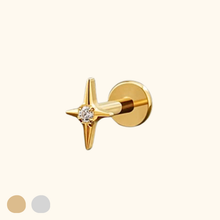Load image into Gallery viewer, Gold earring with star design and clear cubic zirconia stone on a light yellow background