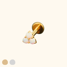 Load image into Gallery viewer, Gold earring with three opal stones on a light yellow background