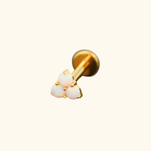 Load image into Gallery viewer, Gold earring with three opal stones on a light yellow background