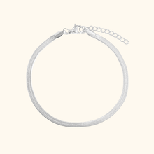 Load image into Gallery viewer, silver bracelet on a light yellow background